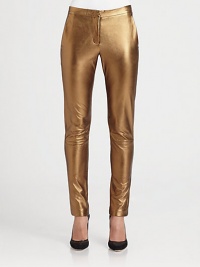 Stretch-leather leggings with a glossy metallic finish and convenient slash pockets. THE FITMedium rise, about 9Inseam, about 30THE DETAILSTab closureZip flyFront slash pocketsFully linedLeatherDry clean with leather specialistImported of Italian fabricModel shown is 5'9 (175cm) wearing US size 4.