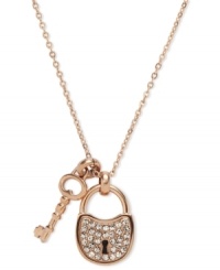 Secure your new look. This glitzy necklace from Fossil features lock and key pendants embellished with clear pave crystals. Crafted in rose-gold tone stainless steel. Approximate length: 16 inches + 2-inch extender. Approximate drop: 7/8 inch. Secure your new look. This glitzy necklace from Fossil features lock and key pendants embellished with clear pave crystals. Crafted in rose-gold tone stainless steel. Approximate length: 16 inches + 2-inch extender. Approximate drop: 7/8 inch.