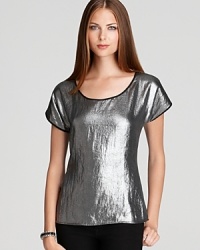 Go for the silver in this simply-structured top that adds party-perfect pizzazz to basic black or denim. Go for the silver in this simply-structured top that adds party-perfect pizzazz to basic black or denim.