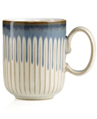 A rustic glaze, textured feel and rounded base make Denby's fluted mug a stylish go-to for cocoa, coffee and soup. Ultra-sturdy stoneware heats and reheats easily for everyday, anytime use. A rustic glaze, textured feel and rounded base make Denby's fluted mug a stylish go-to for cocoa, coffee and soup. Ultra-sturdy stoneware heats and reheats easily for everyday, anytime use.