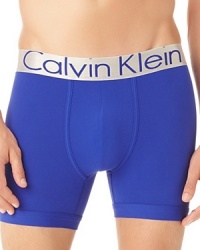 A steel-hued logo waistband adds edge to this bold-colored boxer brief from Calvin Klein. A steel-hued logo waistband adds edge to this bold-colored boxer brief from Calvin Klein.