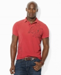 Faded tribal prints update a classic-fitting cotton mesh polo shirt with a rugged, expedition-inspired sensibility. Faded tribal prints update a classic-fitting cotton mesh polo shirt with a rugged, expedition-inspired sensibility.