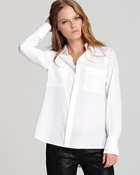 Sheer styling and modern tailoring shake up a menswear-inspired Isaac Mizrahi Jeans shirt. Team with leather leggings and hints of silver for a rocker-luxe look. Sheer styling and modern tailoring shake up a menswear-inspired Isaac Mizrahi Jeans shirt. Team with leather leggings and hints of silver for a rocker-luxe look.