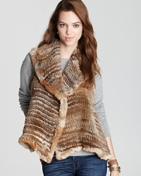 Plush draping and a longer length in back lend sumptuous appeal to Adrienne Landau's fur vest. Plush draping and a longer length in back lend sumptuous appeal to Adrienne Landau's fur vest.