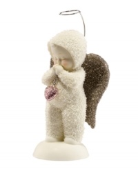 Crafted of pure bisque porcelain, this precious figurine is hand-painted and continues the Snowbabies tradition of lasting childhood innocence and joy. Fine details of sparkling gold enhance its charming beauty and make it a cherished gift for anyone. Crafted of pure bisque porcelain, this precious figurine is hand-painted and continues the Snowbabies tradition of lasting childhood innocence and joy. Fine details of sparkling gold enhance its charming beauty and make it a cherished gift for anyone.
