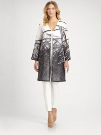 Airy, semi-sheer cotton voile, patterned with a nature-inspired print and tailored in a sophisticated, architectural style.V necklineConcealed button frontWide bracelet sleevesHemline ventsAbout 23 from shoulder to hemCottonDry cleanMade in Switzerland of imported fabricModel shown is 5'10 (177cm) wearing US size 4. Airy, semi-sheer cotton voile, patterned with a nature-inspired print and tailored in a sophisticated, architectural style.V necklineConcealed button frontWide bracelet sleevesHemline ventsAbout 23 from shoulder to hemCottonDry cleanMade in Switzerland of imported fabricModel shown is 5'10 (177cm) wearing US size 4.