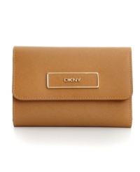 Stay organized anywhere you go with this travel-ready wallet from DKNY that's the right reserve for all your riches. Luxe leather is accented with custom hardware, while the interior is outfitted with plenty of pockets and compartments. Stay organized anywhere you go with this travel-ready wallet from DKNY that's the right reserve for all your riches. Luxe leather is accented with custom hardware, while the interior is outfitted with plenty of pockets and compartments.
