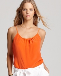 The classic Juicy Couture tank gets an elegant new attitude with a fresh shot of hue-happy silk. A relaxed cut pairs with a ruched neckline for a modern feel. The classic Juicy Couture tank gets an elegant new attitude with a fresh shot of hue-happy silk. A relaxed cut pairs with a ruched neckline for a modern feel.