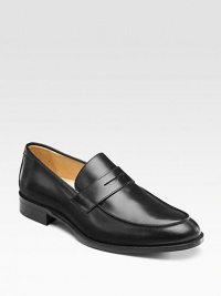 EXCLUSIVELY OURS. Ultimate style and comfort, crafted in Italy with classic penny loafer details in smooth leather. Leather lining Padded insole Leather sole Made in Italy EXCLUSIVELY OURS. Ultimate style and comfort, crafted in Italy with classic penny loafer details in smooth leather. Leather lining Padded insole Leather sole Made in Italy