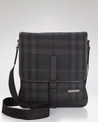A sleek hold-all features Burberry's signature check pattern for an iconic addition to your everyday look. Excellent organization pockets provide easy access to your phone, laptop and other essentials. A sleek hold-all features Burberry's signature check pattern for an iconic addition to your everyday look. Excellent organization pockets provide easy access to your phone, laptop and other essentials.