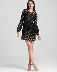 Hippie-chic arrives with this Twelfth Street by Cynthia Vincent mini dress with bell sleeves and a babydoll-inspired silhouette. Add wedge sandals to the printed look and head out with the band. Hippie-chic arrives with this Twelfth Street by Cynthia Vincent mini dress with bell sleeves and a babydoll-inspired silhouette. Add wedge sandals to the printed look and head out with the band.