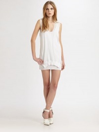 Sheer cotton mesh in a layered mini-tank silhouette.ScoopneckSleevelessSplit overlayCut-out backAbout 18 from natural waistCottonDry cleanImportedModel shown is 5'10 (177cm) wearing US size Small. Sheer cotton mesh in a layered mini-tank silhouette.ScoopneckSleevelessSplit overlayCut-out backAbout 18 from natural waistCottonDry cleanImportedModel shown is 5'10 (177cm) wearing US size Small.