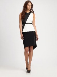 Enter fashion territory with this kicky peplum top, defined by contrasting leather paneling that forms an asymmetrical pattern. RoundneckSleevelessPeplum hemExposed back zipperBody: LeatherTrim: Rayon/nylon/polyurethaneDry clean with leather specialistImportedModel shown is 5'9½ (176cm) wearing US size 4. Enter fashion territory with this kicky peplum top, defined by contrasting leather paneling that forms an asymmetrical pattern. RoundneckSleevelessPeplum hemExposed back zipperBody: LeatherTrim: Rayon/nylon/polyurethaneDry clean with leather specialistImportedModel shown is 5'9½ (176cm) wearing US size 4.