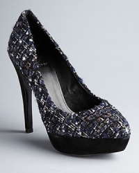 Satisfy your need for tweed: these Tory Burch platform pumps take the trendy material across your entire closet. Satisfy your need for tweed: these Tory Burch platform pumps take the trendy material across your entire closet.