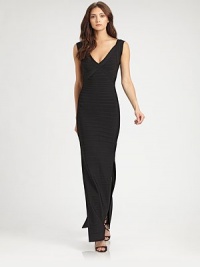 An elegant incarnation of the signature bandage dress, this masterfully tailored floor-length design is a sure head-turner.V necklineSleevelessSide slitsBandage constructionV back with concealed zipAbout 47 from natural waist90% rayon/9% nylon/1% spandexDry cleanImportedModel shown is 5'11 (180cm) wearing US size Small. An elegant incarnation of the signature bandage dress, this masterfully tailored floor-length design is a sure head-turner.V necklineSleevelessSide slitsBandage constructionV back with concealed zipAbout 47 from natural waist90% rayon/9% nylon/1% spandexDry cleanImportedModel shown is 5'11 (180cm) wearing US size Small.