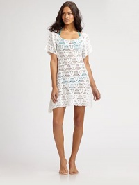 A delicately designed coverup with a flattering square neckline. Square neckShort sleevesMacrame detailPull-on styleAsymmetrical hemRayonHand washImported A delicately designed coverup with a flattering square neckline. Square neckShort sleevesMacrame detailPull-on styleAsymmetrical hemRayonHand washImported