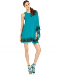 An oversized one-shoulder sleeve adds drama to this glam MM Couture sequined dress -- perfect for a summer soiree! An oversized one-shoulder sleeve adds drama to this glam MM Couture sequined dress -- perfect for a summer soiree!