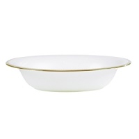 Rings of gold adorn fine white bone china with the lustrous shine of a wedding band. White bone china features two different border trims of gold, a wide corded border of textured grosgrain ribbon on some pieces, a narrow edge on others. Rings of gold adorn fine white bone china with the lustrous shine of a wedding band. White bone china features two different border trims of gold, a wide corded border of textured grosgrain ribbon on some pieces, a narrow edge on others.
