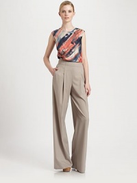 Phenomenally designed wool pants with well-placed pleats for high-fashion appeal. A hint of stretch offers an enviable fit.Waist dartsSide zipperSlash pocketsWide-leg styleInseam, about 33Rise, about 1396% wool/4% elastaneDry cleanImported of Italian fabric Model shown is 5'10 (177cm) wearing US size 4. Phenomenally designed wool pants with well-placed pleats for high-fashion appeal. A hint of stretch offers an enviable fit.Waist dartsSide zipperSlash pocketsWide-leg styleInseam, about 33Rise, about 1396% wool/4% elastaneDry cleanImported of Italian fabric Model shown is 5'10 (177cm) wearing US size 4.
