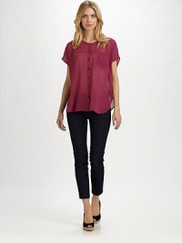 A silk button-down blouse offering a relaxed fit and everyday-chic look.Round neckShort sleevesButton frontAbout 26 from shoulder to hemSilkDry cleanImported A silk button-down blouse offering a relaxed fit and everyday-chic look.Round neckShort sleevesButton frontAbout 26 from shoulder to hemSilkDry cleanImported