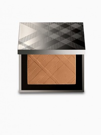 A multi-sensory texture that reproduces the skin's natural colour. Warm Glow Natural Bronzer warms the complexion to achieve a sun-kissed look as emollient agents smooth the skin offering a natural and healthy glow. Contains UV filters to protect from damaging environmental exposure. Apply with the Burberry Beauty Brush in a circular motion from the cheek into the hairline. Lightly dust across rest of face to give a sun-kissed look. A multi-sensory texture that reproduces the skin's natural colour. Warm Glow Natural Bronzer warms the complexion to achieve a sun-kissed look as emollient agents smooth the skin offering a natural and healthy glow. Contains UV filters to protect from damaging environmental exposure. Apply with the Burberry Beauty Brush in a circular motion from the cheek into the hairline. Lightly dust across rest of face to give a sun-kissed look.
