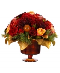 Introduce a colorful, festive accent to your table or mantel with this holiday centerpiece from Winward. Offering several blossoms in a warm colorway, it is sure to liven up the wintry months with beauty. Introduce a colorful, festive accent to your table or mantel with this holiday centerpiece from Winward. Offering several blossoms in a warm colorway, it is sure to liven up the wintry months with beauty.