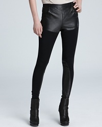 Flaunt your fashion authority in ultra-skinny Jean Paul Gaultier pants adorned with soft leather panels for a look rich with editorial edge. Flaunt your fashion authority in ultra-skinny Jean Paul Gaultier pants adorned with soft leather panels for a look rich with editorial edge.