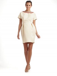 An intricately beaded neckline takes this simple silk/linen sheath from classic to glamorous.Beaded crew neckline Pleated waist Short sleeves V-back Back zipper Fully lined About 33 from shoulder to hem 75% silk/25% linen Dry clean Made in Italy An intricately beaded neckline takes this simple silk/linen sheath from classic to glamorous.Beaded crew neckline Pleated waist Short sleeves V-back Back zipper Fully lined About 33 from shoulder to hem 75% silk/25% linen Dry clean Made in Italy