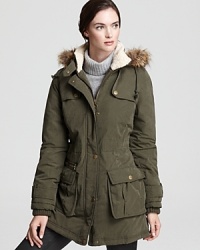 This luxe take on the anorak comes to you from DKNY. Perfect for days and nights, weekdays and weekends, you can now greet the inclement weather in utilitarian-chic style. This luxe take on the anorak comes to you from DKNY. Perfect for days and nights, weekdays and weekends, you can now greet the inclement weather in utilitarian-chic style.