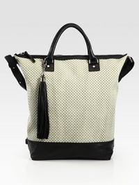 A woven print highlights this slouchy leather carryall, finished with dual straps and contrast trim.Double top handles, 5 dropAdjustable shoulder strap, 9-10 dropTop zip closureOne inside zip pocketThree inside open pocketsCotton lining16½W X 16½H X 6¾DImported A woven print highlights this slouchy leather carryall, finished with dual straps and contrast trim.Double top handles, 5 dropAdjustable shoulder strap, 9-10 dropTop zip closureOne inside zip pocketThree inside open pocketsCotton lining16½W X 16½H X 6¾DImported
