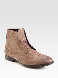 A classic brogue boot is constructed in a rich suede and slightly burnished and distressed for a well-worn look.Suede upperLeather liningRubber soleImported A classic brogue boot is constructed in a rich suede and slightly burnished and distressed for a well-worn look.Suede upperLeather liningRubber soleImported