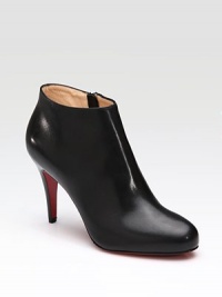 An essential style in every wardrobe, this soft leather design perfectly grazes the ankle.Self-covered heel, 3½ (90mm) Rounded toe Side zipper Leather lining Padded insole Signature red leather sole Made in ItalyOUR FIT MODEL RECOMMENDS ordering one half size up as this style runs small. An essential style in every wardrobe, this soft leather design perfectly grazes the ankle.Self-covered heel, 3½ (90mm) Rounded toe Side zipper Leather lining Padded insole Signature red leather sole Made in ItalyOUR FIT MODEL RECOMMENDS ordering one half size up as this style runs small.