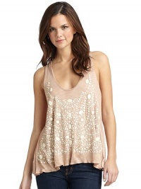 THE LOOKAllover beaded stone embellishmentsScoopneckGently ruffled hemRacerbackTHE FITAbout 27 from shoulder to hemTHE MATERIALRayonCARE & ORIGINDry cleanMade in USAModel shown is 5'11 (180cm) wearing US size Small. THE LOOKAllover beaded stone embellishmentsScoopneckGently ruffled hemRacerbackTHE FITAbout 27 from shoulder to hemTHE MATERIALRayonCARE & ORIGINDry cleanMade in USAModel shown is 5'11 (180cm) wearing US size Small.