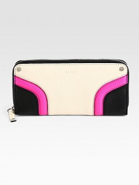 High-impact hues transform this pebbled leather silhouette with a zip-around closure. Zip-around closureOne inside zip pocketTwo bill compartmentsTwelve credit card slotsFully lined8W X 4H X 1DImported High-impact hues transform this pebbled leather silhouette with a zip-around closure. Zip-around closureOne inside zip pocketTwo bill compartmentsTwelve credit card slotsFully lined8W X 4H X 1DImported