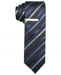 Create a little cool contrast in the concrete jungle with this striped skinny tie from Alfani RED. Create a little cool contrast in the concrete jungle with this striped skinny tie from Alfani RED.