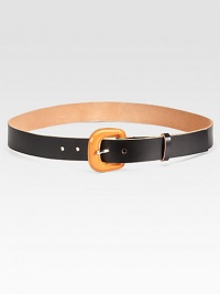 A vivid, contrasting buckle adds mod style to a classic leather design.Buckle closureWidth, about 1.5Made in Italy