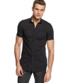 Arm your self with on-trend summer style with this short-sleeved shirt from Calvin Klein.