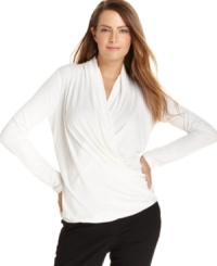 Soft draping makes for a fabulous fit. Calvin Klein's elegant top looks lovely alone or layered with jackets and blazers. Soft draping makes for a fabulous fit. Calvin Klein's elegant top looks lovely alone or layered with jackets and blazers.