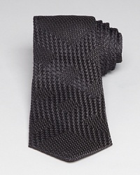 At first glance this handsome silk tie appears to offer a simple abstract texture, but spend more time here and note the carefully crafted pattern on the surface – a subtle but clear signature check design by none other than Burberry London. At first glance this handsome silk tie appears to offer a simple abstract texture, but spend more time here and note the carefully crafted pattern on the surface – a subtle but clear signature check design by none other than Burberry London.