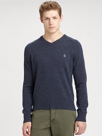 Classic-fit sweater shaped in pure lambswool with contrasting donegal details, accented with embroidered penguin detail at the chest.V-neckRibbed knit collar, cuffs and hemLambswoolDry cleanImported Classic-fit sweater shaped in pure lambswool with contrasting donegal details, accented with embroidered penguin detail at the chest.V-neckRibbed knit collar, cuffs and hemLambswoolDry cleanImported