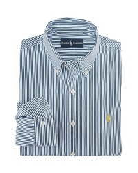 A trim-fitting long-sleeved shirt is crafted from silky cotton poplin in a bold striped pattern. A trim-fitting long-sleeved shirt is crafted from silky cotton poplin in a bold striped pattern.