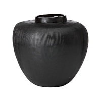 Embodying Donna Karan's sensual, natural style, this vase is textured, layered and draped in a swirl of liquid and air. Embodying Donna Karan's sensual, natural style, this vase is textured, layered and draped in a swirl of liquid and air.