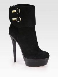 Shiny goldtone buttons pump up this sexy ankle boot, finished with an edgy back zip. Stacked heel, 6 (150mm)Stacked platform, 1¾ (45mm)Compares to a 4¼ heel (110mm)Suede upper with metal buttonsBack zipLeather lining and solePadded insoleImported Shiny goldtone buttons pump up this sexy ankle boot, finished with an edgy back zip. Stacked heel, 6 (150mm)Stacked platform, 1¾ (45mm)Compares to a 4¼ heel (110mm)Suede upper with metal buttonsBack zipLeather lining and solePadded insoleImported