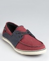 A playful variation on the classic boat shoe, with sporty sneaker accents and an on-trend color-block style.