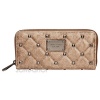 Michael Kors Quilted Studs Zip Around Continental in Metallic Nickel