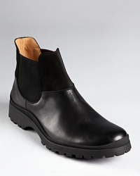 A modern boot for the modern man, featuring a subtle but striking contrast of suede and leather, designed for versatility and maximum coolness. A modern boot for the modern man, featuring a subtle but striking contrast of suede and leather, designed for versatility and maximum coolness.