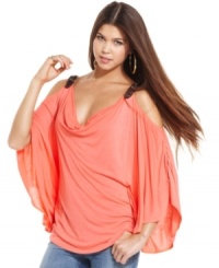 Belt-buckle accents add a dose of rugged style to this top from Baby Phat, while voluminous batwing sleeves create endless drama! Belt-buckle accents add a dose of rugged style to this top from Baby Phat, while voluminous batwing sleeves create endless drama!