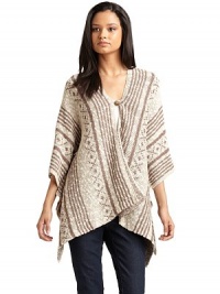 THE LOOKIntarsia printMock poncho silhouetteRound necklineSingle front button closureThree-quarter length poncho sleevesAsymmetrical hemTHE FITAbout 28 from shoulder to hemTHE MATERIAL60% cotton/40% linenCARE & ORIGINHand washImportedModel shown is 5'10 (177cm) wearing US size Small. THE LOOKIntarsia printMock poncho silhouetteRound necklineSingle front button closureThree-quarter length poncho sleevesAsymmetrical hemTHE FITAbout 28 from shoulder to hemTHE MATERIAL60% cotton/40% linenCARE & ORIGINHand washImportedModel shown is 5'10 (177cm) wearing US size Small.
