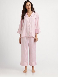 Brushed-back satin, so soft and warm inside, shimmers with a subtle floral print.Notched lapelsButton frontLong sleevesElastic waist pantsInseam, about 26Polyester/cottonMachine washImported Brushed-back satin, so soft and warm inside, shimmers with a subtle floral print.Notched lapelsButton frontLong sleevesElastic waist pantsInseam, about 26Polyester/cottonMachine washImported