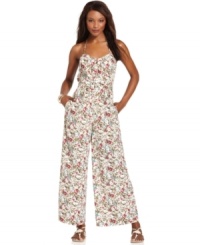 An allover abstract print adds a modern edge to this BCBGeneration wide-leg jumpsuit, perfect for chic day-to-night style! An allover abstract print adds a modern edge to this BCBGeneration wide-leg jumpsuit, perfect for chic day-to-night style!